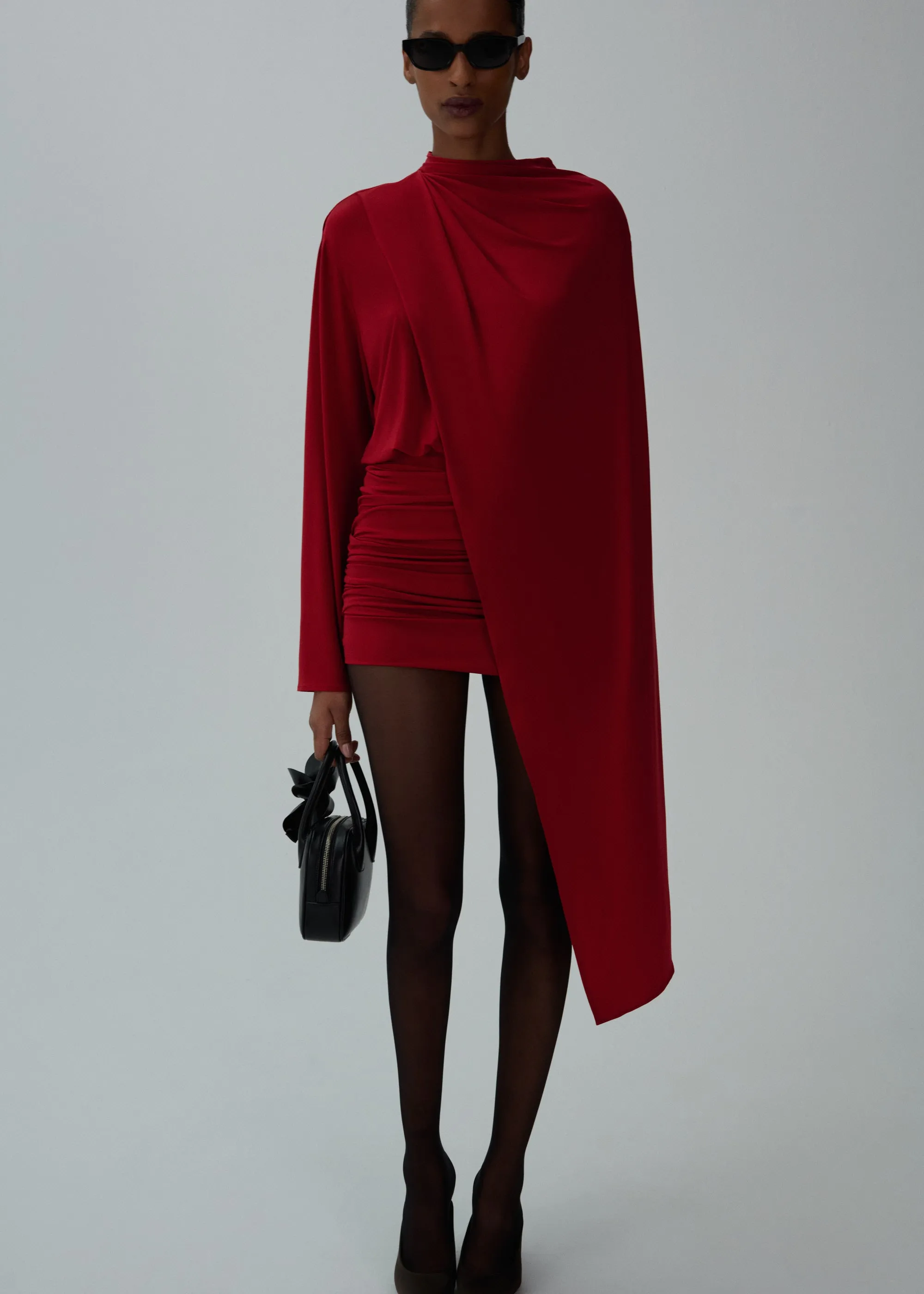 Long-sleeve cape-effect dress in red